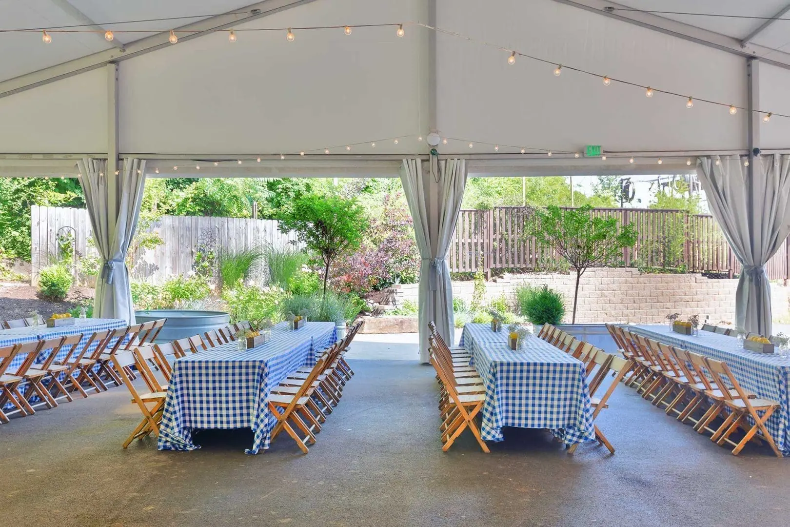 Picnic tables setup under tent