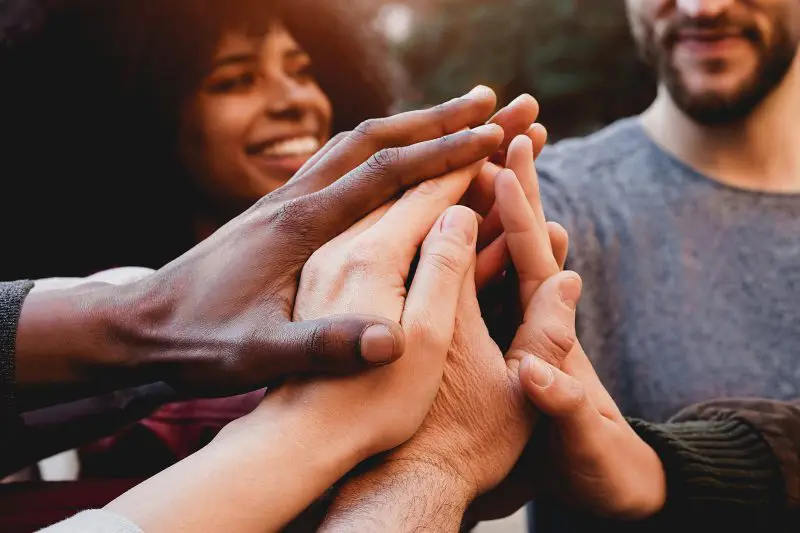 Hands in the middle of a circle