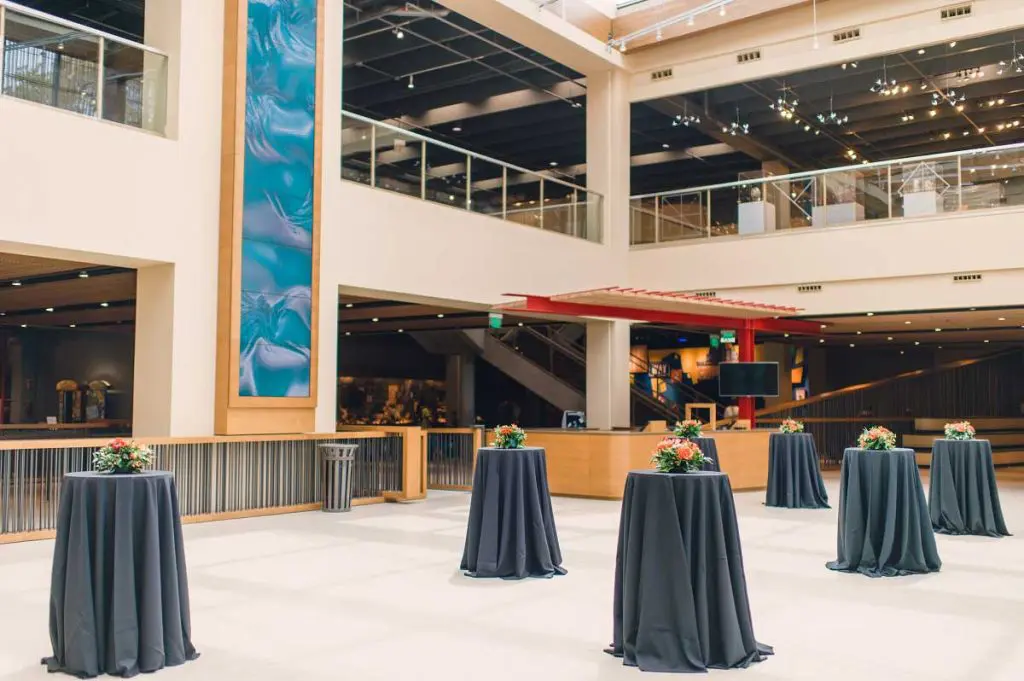 Cocktail tables in atrium of building