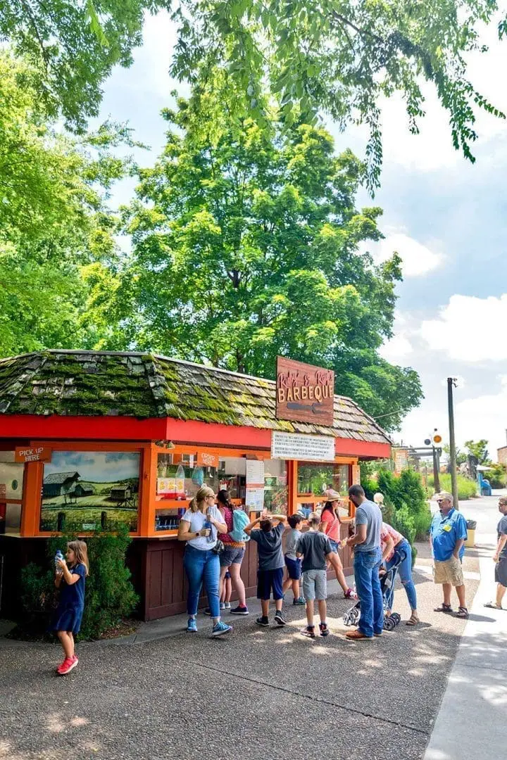People waiting in line at food stand