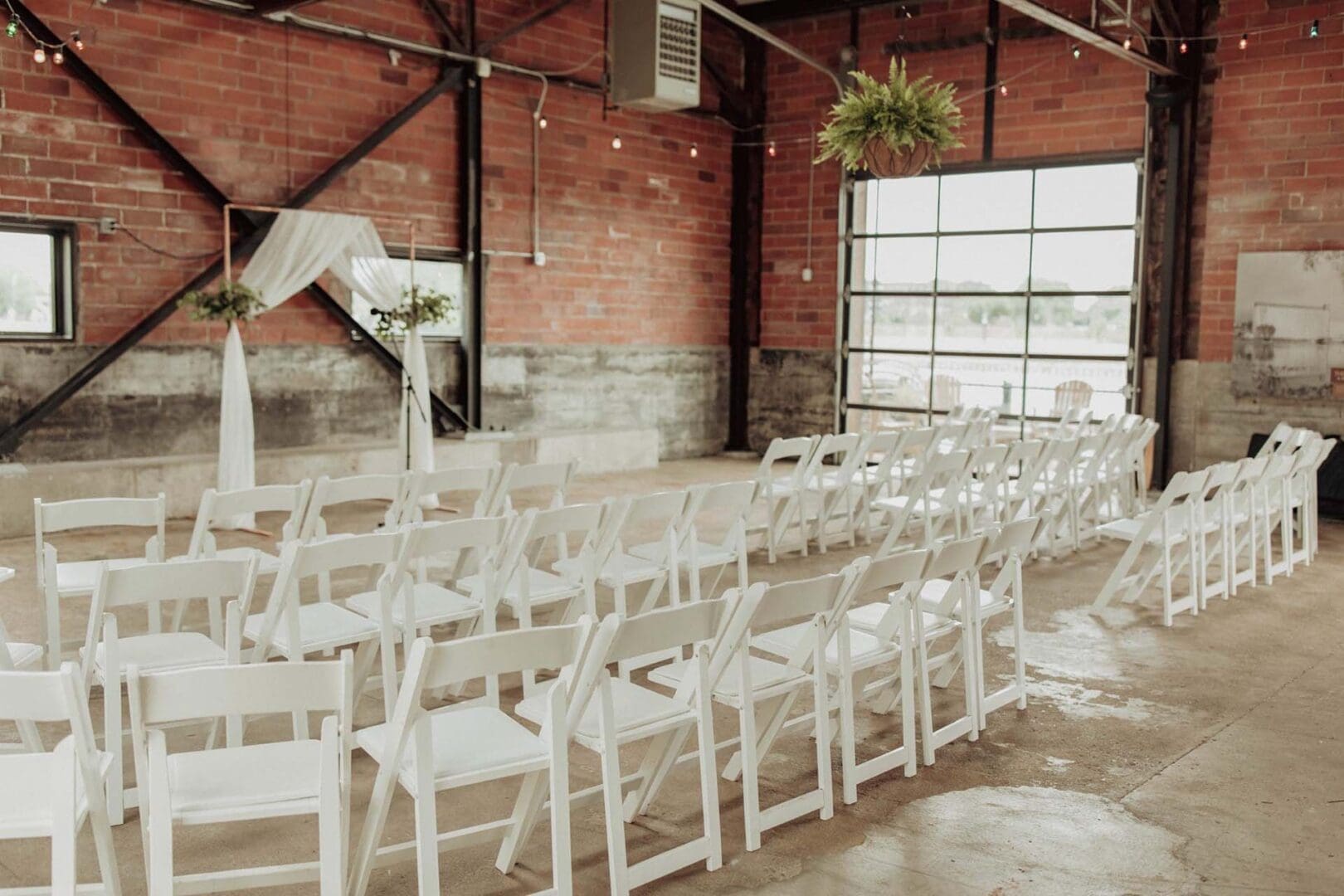 Interior of City House with white chairs for wedding event