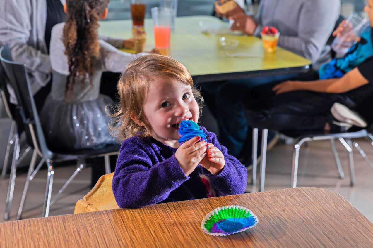 Child eating cupcake